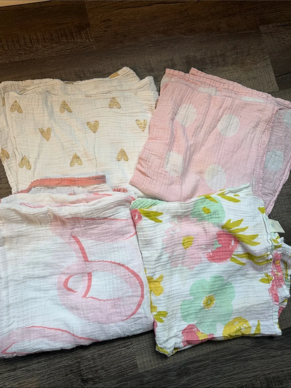 set of 4 cloud island Baby Muslin Swaddle Set in Pink, White, Gold, Green